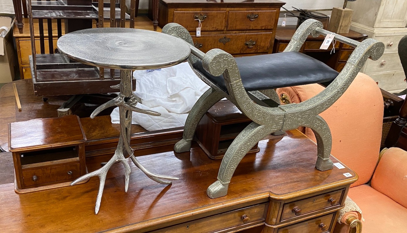 A contemporary cast metal faux stag antler tripod wine table, diameter 39cm, height 53cm together with a metal mounted 'X' framed dressing stool